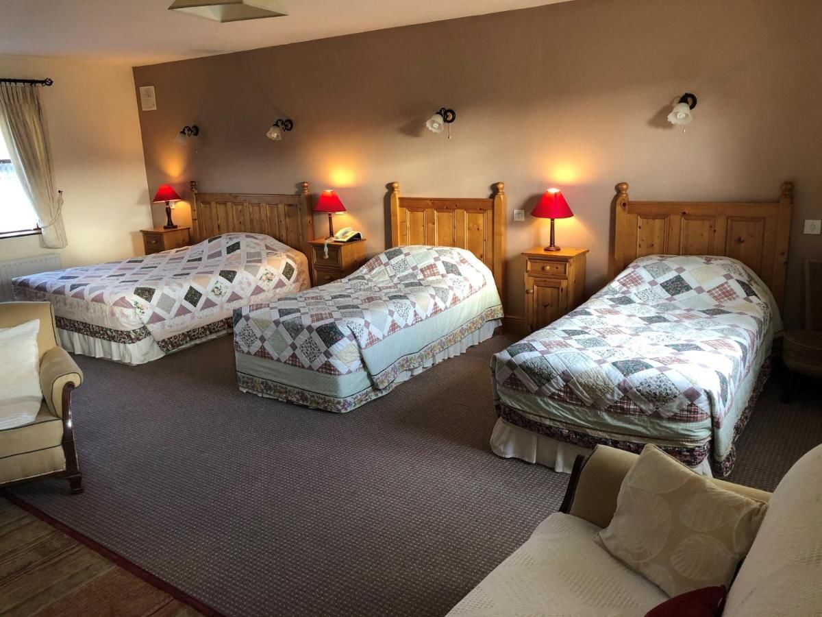 Гостевой дом The Courtyard Guesthouse Бунратти